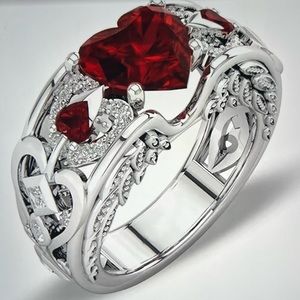 Red heart shaped eternity band ring, size 8